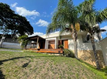 Foto 01 · Casa moderna com 3 dormitórios em amplo terreno de esquina