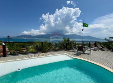 Casa · 272m² · 4 Quartos · 4 Vagas · "Luxo e Exclusividade em Ilhabela: Sua Casa dos Sonhos".