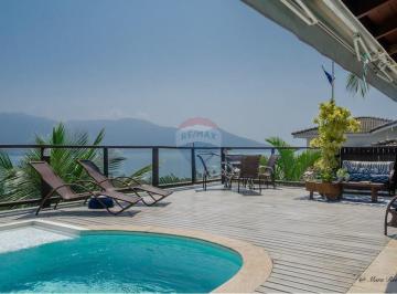 Casa · 272m² · 4 Quartos · 4 Vagas · "Luxo e Exclusividade em Ilhabela: Sua Casa dos Sonhos".