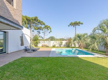 1 · Casa em condomínio com 603.38 m², 5 quartos sendo 5 suítes à venda no bairro Santa Felicidade.