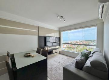 Apartamento · 64m² · 2 Quartos · 1 Vaga · Apartamento com 2 dormitórios 1 suíte mobiliado com box/vaga de garagem no bairro Navegantes em Capã