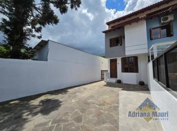Fachada · Casa à venda em Porto Alegre-RS, Cristo Redentor: 4 quartos, 1 suíte, 141m² - Imperdível!