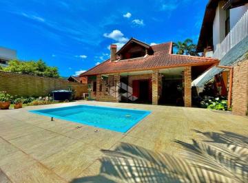 Casa · 260m² · 4 Quartos · 2 Vagas · CASA AMPLA SEMIMOBILIADA COM 4 QUARTOS SENDO 1 SUÍTE E 2 VAGAS DE GARAGEM NO BAIRRO JOÃO PAULO EM FL