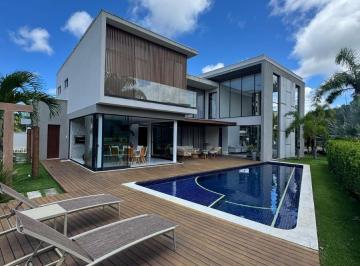 Casa · 520m² · 5 Quartos · 4 Vagas · Casa a venda em alphaville litoral 1 com 5 suites mobiliada