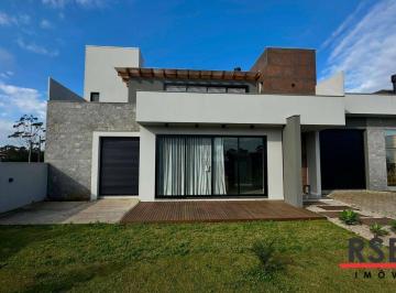 c54b8ee14bbd827d24c9d89af6f38e5d588e37b9 · Casa com 3 dormitórios à venda, 180 m² por R$ 790.000 - Bellatorres - Passo de Torres/SC
