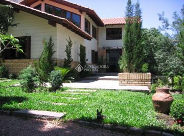 5c79b3ea-c82f-49e4-bdad-b8bffacd53cd · Casa 4 dormitórios com amplo  na parte alta da Dr. Barcelos em amplo terreno arborizado!.