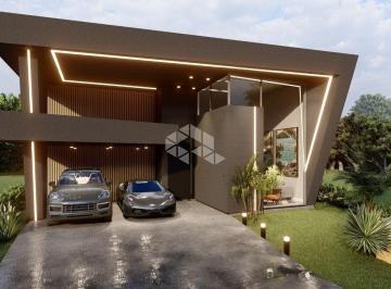 Casa · 231m² · 4 Quartos · 2 Vagas · Vendo: Casa 231m², quatro suítes, beira lago, Pé direito duplo, condomínio fechado