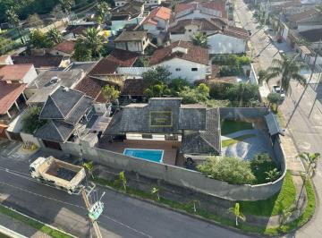 Casa · 237m² · 3 Quartos · 4 Vagas · Casa térrea de esquina à venda no bairro Cidade Jardim Caraguatatuba