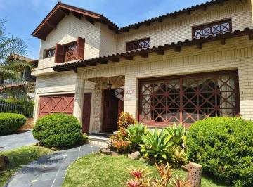 Casa · 247m² · 3 Quartos · 4 Vagas · Casa com 3 dormitórios e piscina, bairro Ipanema em Porto Alegre