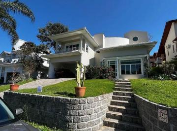 internet_20250410_122737_1-17442996608806.webp · Casa 5 Dormitórios (4 Suítes) - Cacupé, Florianópolis/SC