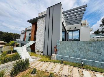 ceffa163-8cc9-4e7f-ad32-08da37f025dd-17761970193628.jpg · Casa com 3 suítes à venda na Pedra Branca, Palhoça — tecnologia, design e sustentabilidade