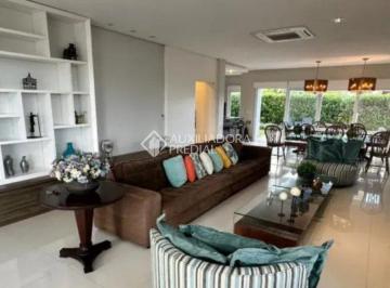 Casa · 440m² · 5 Quartos · 4 Vagas · Linda residencia de alto padrão com 5 suítes, mobiliada, no Condomínio Ocean Side em Torres RS