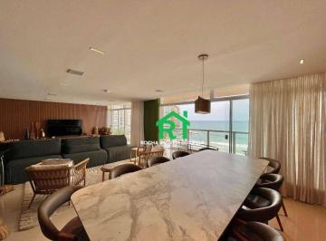 Sala · Apartamento frente mar com 5 quartos (5 suítes), 1 vaga à venda em Pitangueiras, Guarujá