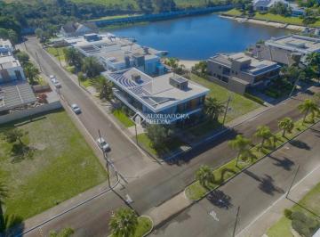Casa · 570m² · 7 Quartos · 4 Vagas · Casa em Condomínio com 7 Suítes, Piscina e Elevador no Velas da Marina, Capão da Canoa