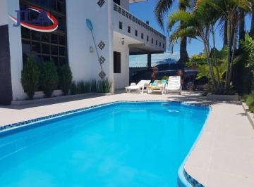 3cfd59358ef7712fe04e15a2e348d89221216937 · Casa com piscina à venda, 130 m² por R$ 1.250.000 - Centro - Guaratuba/PR