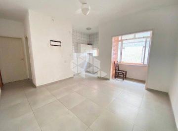 Sala · Apartamento de 1 dormitório no centro de Capão da Canoa