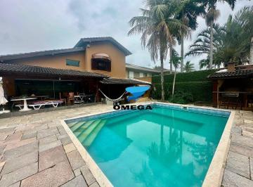 3058f11b9605a6886d6d72aec708e219f50dde33 · Casa à venda em Condomínio Jardim Acapulco no Guarujá | Omega Imóveis