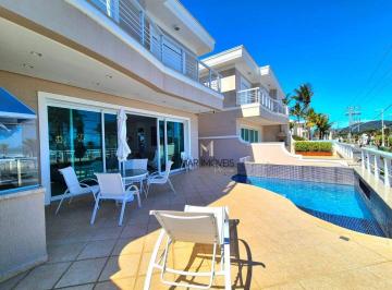5afce194f08b73901d4a2612645102b04f83d3df · Casa em condomínio de alto padrão frente a praia da Enseada no Guarujá com 5 dormitórios e piscina p