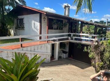 Terreno · 360m² · 2 Quartos · 2 Vagas · Terreno com prédio misto construído com 2 andares , pátio com piscina e 1 vaga no loteamento Stela