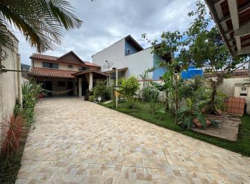 Imagem do Imóvel · CASA À VENDA NO PEREQUE AÇU com 3 dormitórios,3 vagas de garagem e varanda