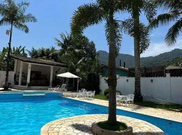 Imagem do Imóvel · Belíssima casa em condomínio fechado com 6 dorms sendo 5 suítes com uma ilha na piscina