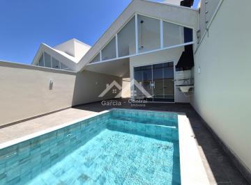 Foto 01 · Casa com piscina em Peruíbe
