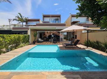 Imagem do Imóvel · Casa pé na areia à venda na praia de Juquehy - Cond. Fechado com 4 suítes e piscina