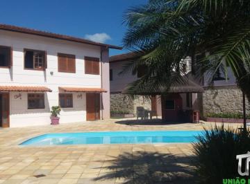 Foto 01 · Casa em Condomínio à Venda em Maranduba - Ubatuba-SP! Desfrute de momentos únicos a apenas 400m da p