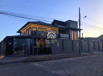 Foto 01 · Viva com luxo e conforto: Casa de Alto Padrão no VILLAGE - Imbituba/SC  5 quartos, 4 banheiros, 300m