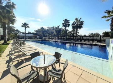 Apartamento · 131m² · 3 Quartos · 2 Vagas · Apartamento à venda em Atlântida, Xangri-Lá, com 3 quartos (1 suíte), 132m² e infraestrutura de reso
