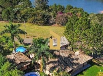 ea96052d97ffadf28f5c26c7d79dc98ea858fb8c · Casa de campo em condomínio fechado | 330m² | 4 dormitórios | 2 suítes | 6 vagas | Piscina | Spa | M