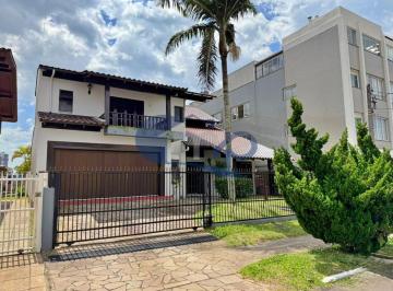 Casa · 384m² · 6 Quartos · 2 Vagas · Casa á venda com 6 dormitórios no centro de Torres/RS