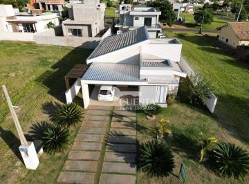 93844c0d80fa5463f3680521d4b15904bcb312bf · Casa com 3 dormitórios à venda, 160 m² por R$ 750.000,00 - Condomínio Ninho Verde II - Pardinho/SP