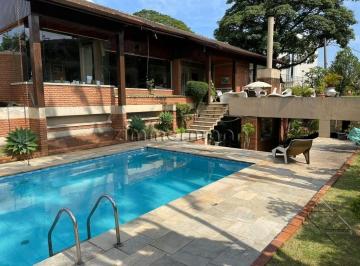 Casa · 323m² · 4 Quartos · CASA SOBRADO NO CAXINGUI DE 4 DORMITÓRIOS E PISCINA