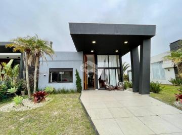 Casa · 155m² · 4 Quartos · 2 Vagas · Casa de praia a venda no condominio Rivieira com 04 suites!