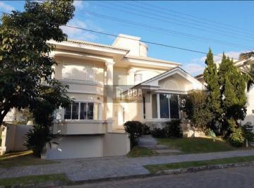 751f567d8296.jpg · Diferenciada casa com fantástica adega e excelente localização.