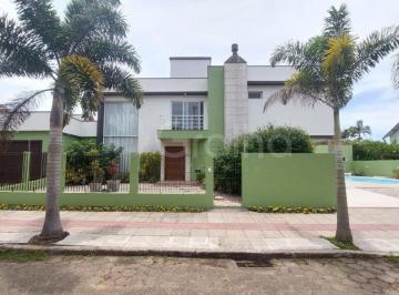 41014_ic91o_410146925c6c173dfa.jpg · Casa com 4 suítes na praia da Armação