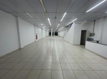 Foto 01 · Imóvel com renda em rua comercial