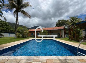 b007b27d922c358cd77a5c8e723ff30e411af33a · Casa com 4 dormitórios à venda, 265 m² por R$ 1.200.000,00 - Jardim Europa - Peruíbe/SP