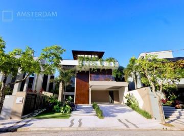 Foto 01 · Casa à venda no M17 na Riviera, com 738 m² de área construída, 7 suítes, rooftop com 126 m².