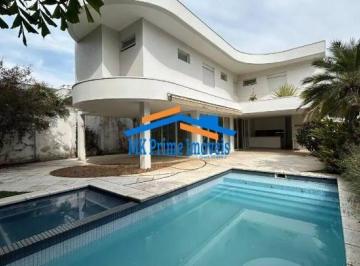 Casa · 630m² · 4 Quartos · 4 Vagas · Casa Contemporânea de Alto Padrão – 4 Suítes, Cinema e Lazer Completo