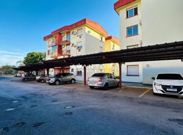 Apartamento · 60m² · 2 Quartos · 1 Vaga · Excelente apartamento de 2 dormitórios com garagem no bairro Nossa Senhora de Lo