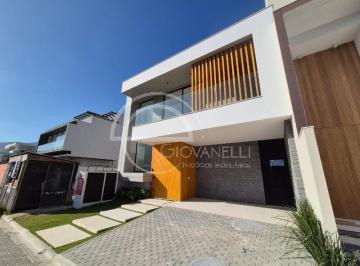 Foto 01 · Casa contemporânea triplex no condomínio Villa Blanca, 3 suítes, 300m², com terraço, piscina, lazer