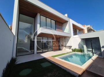 Foto 01 · Casa contemporânea triplex no condomínio Villa Blanca, 4 quartos, 275m², terraço, piscina, lazer com