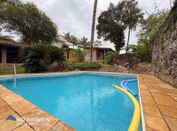 Foto 01 · Casa à venda em Ilhabela com piscina, área gourmet, 4 suítes e edícula  640m² de terreno - 258,94 m²