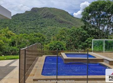 Foto 01 · Uma casa moderna a venda no condomínio Veredas das Gerais, Casa com vista para a Mata e Morro do Ele