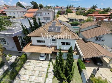 Casa · 400m² · 5 Quartos · 4 Vagas · Casa de alto padrão em condomínio nobre 4 suítes, piscina aquecida e automação completa