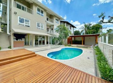 Casa · 331m² · 4 Quartos · 6 Vagas · Casa Moderna com Vista de Cinema na Aldeia da Fazendinha - 4 Suítes, Gourmet Completa & Piscina