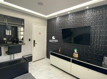 Sala · Apartamento à venda no Gonzaguinha em São Vicente.