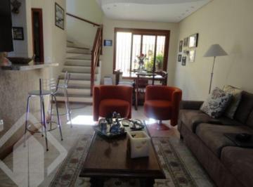 Casa · 216m² · 3 Quartos · 2 Vagas · Casa com 3 pavimentos em condomínio pequeno (5 casas), parte alta do bairro.